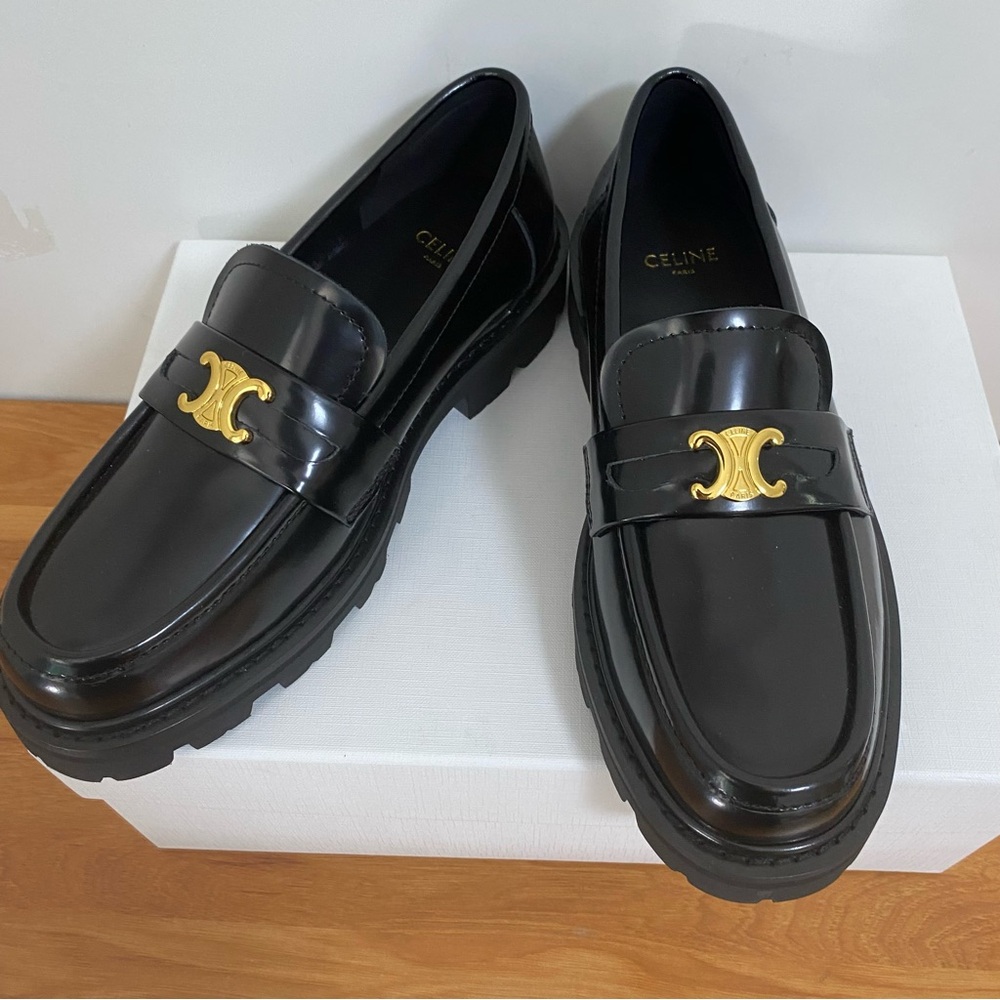 Celine Black Patent Leather Lug-Sole Penny Loafers with Gold Emblem